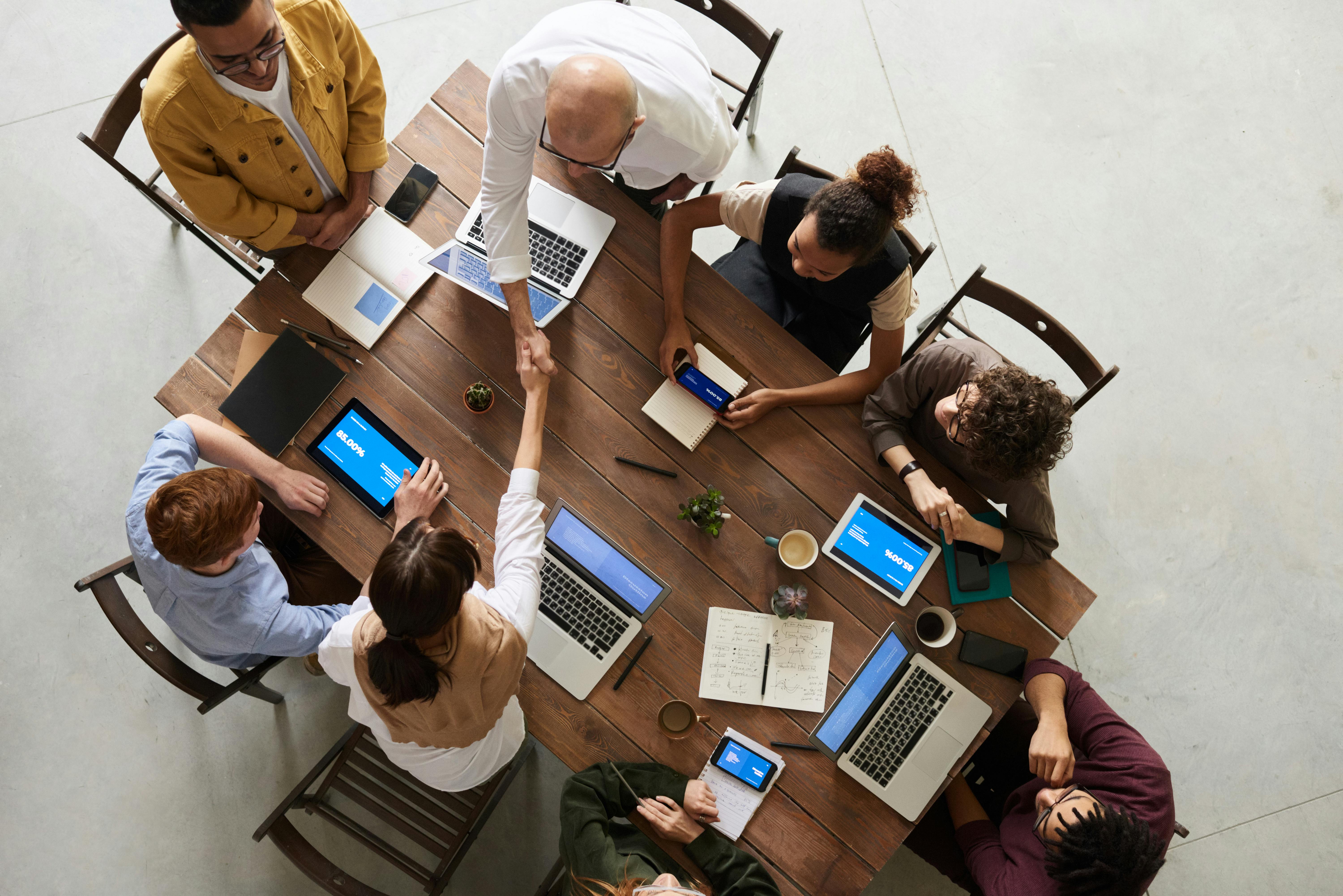 Intellectra team collaborating around a conference table
